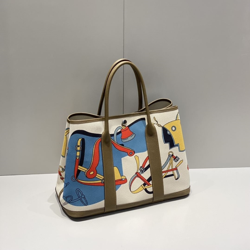 H**mes shopping bags